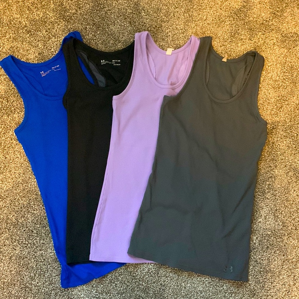 4 under armour heat gear workout tanks, colors black, gray, royal blue, & lilac